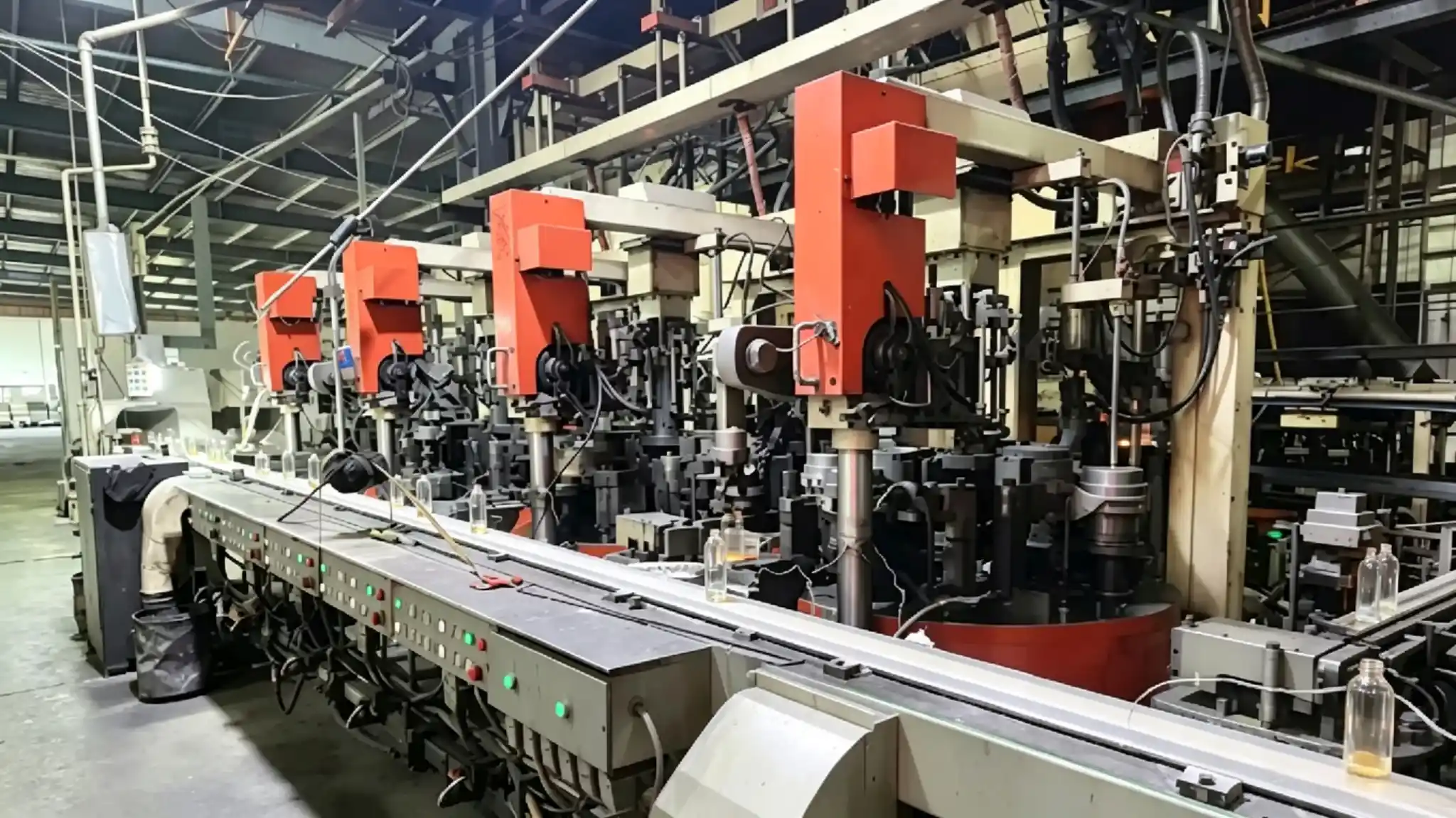 HangoTech I.S. machine workshop for glass container production