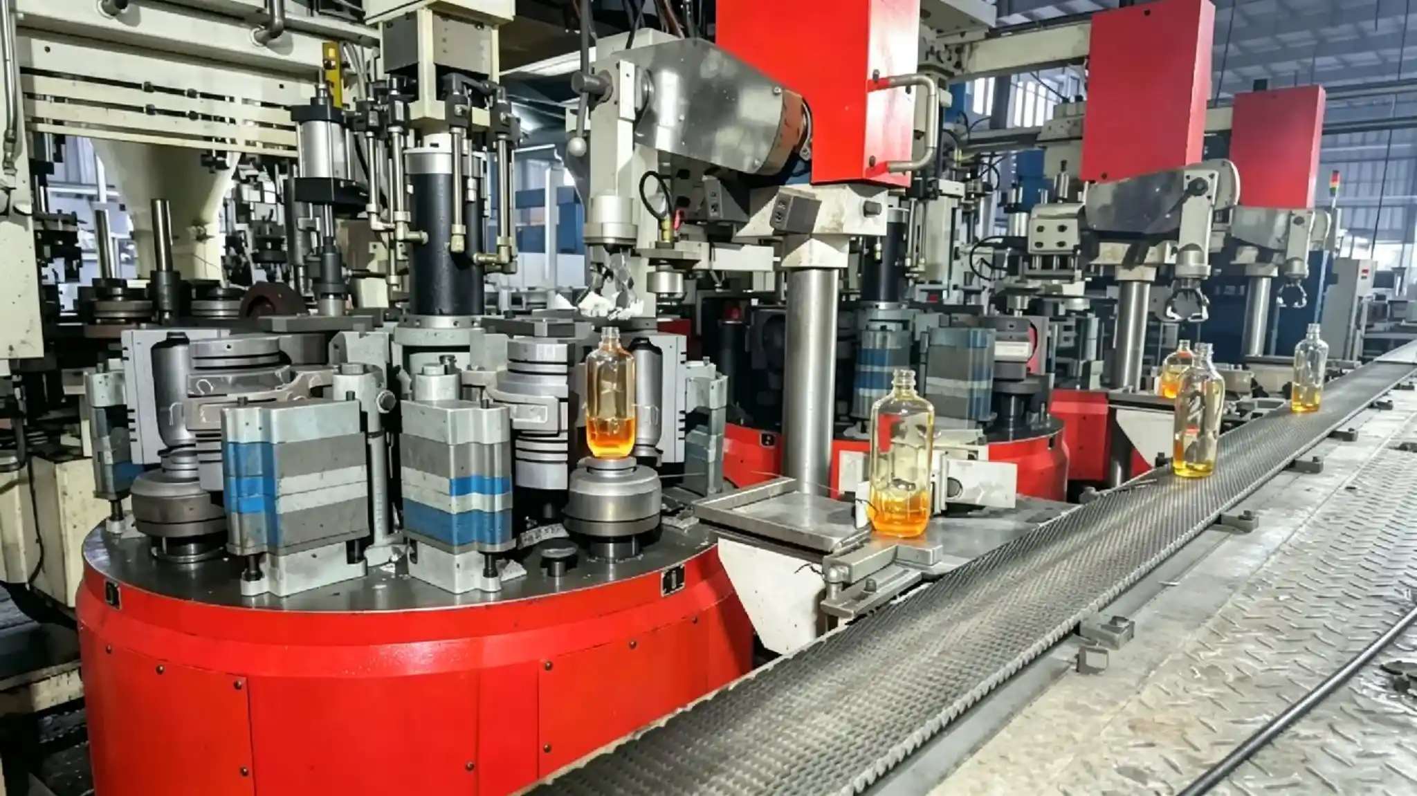 Glass bottle forming machinery in operation