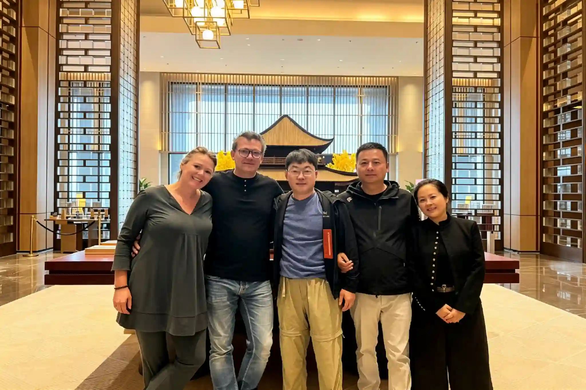 HangoTech team meeting international customers in a hotel lobby