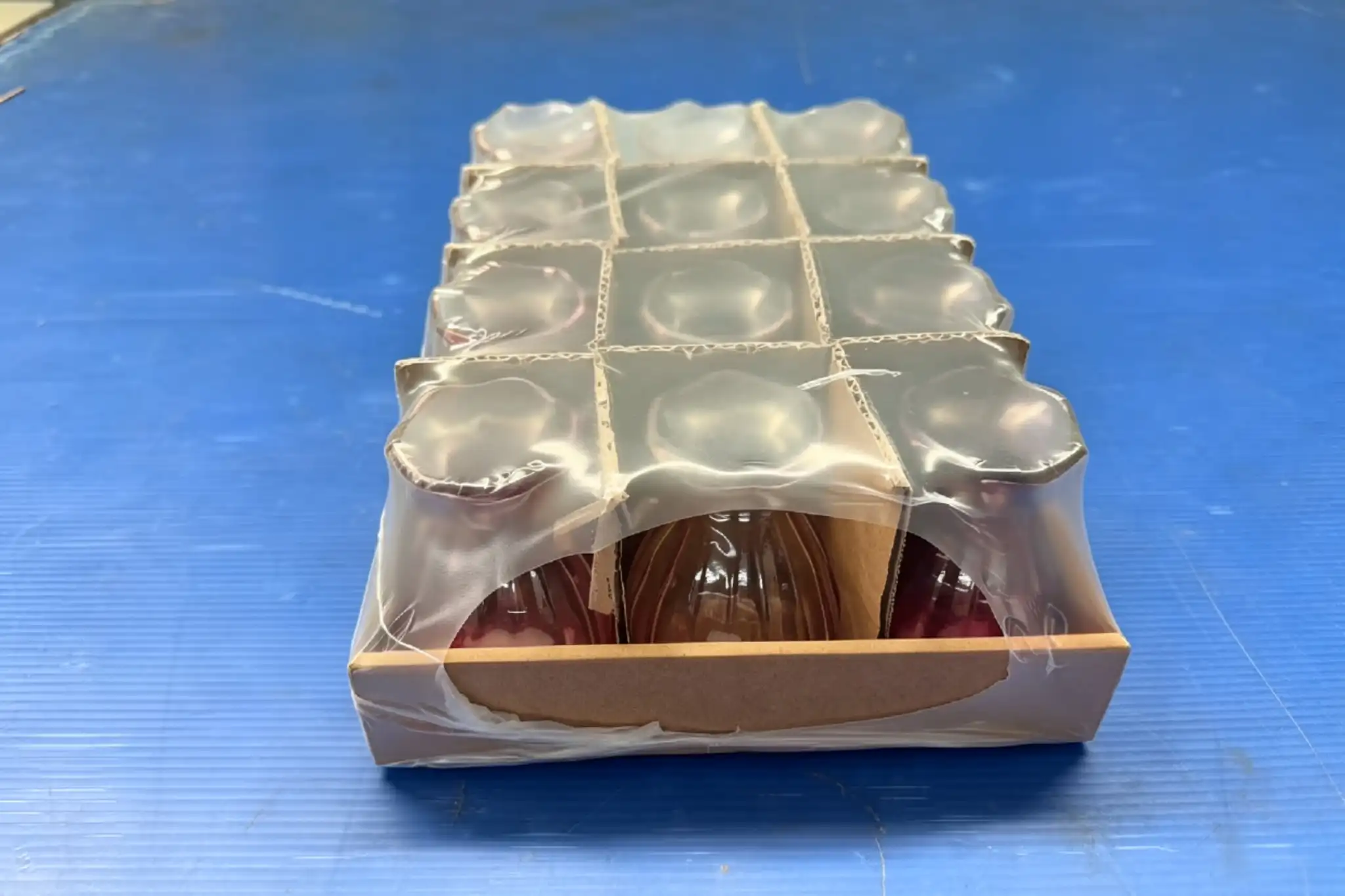 Side profile of finished glass product packaging